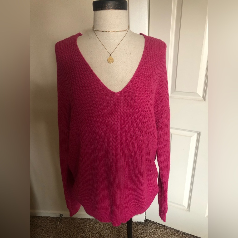 Super cute pink sweater pullover!! Cut low/high in back but covers bra straps.